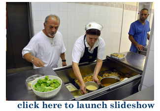 Rita helping to deliver food in hospital