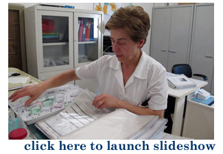 Nurse Ornella Luchetti sorts pills according to doctor's orders